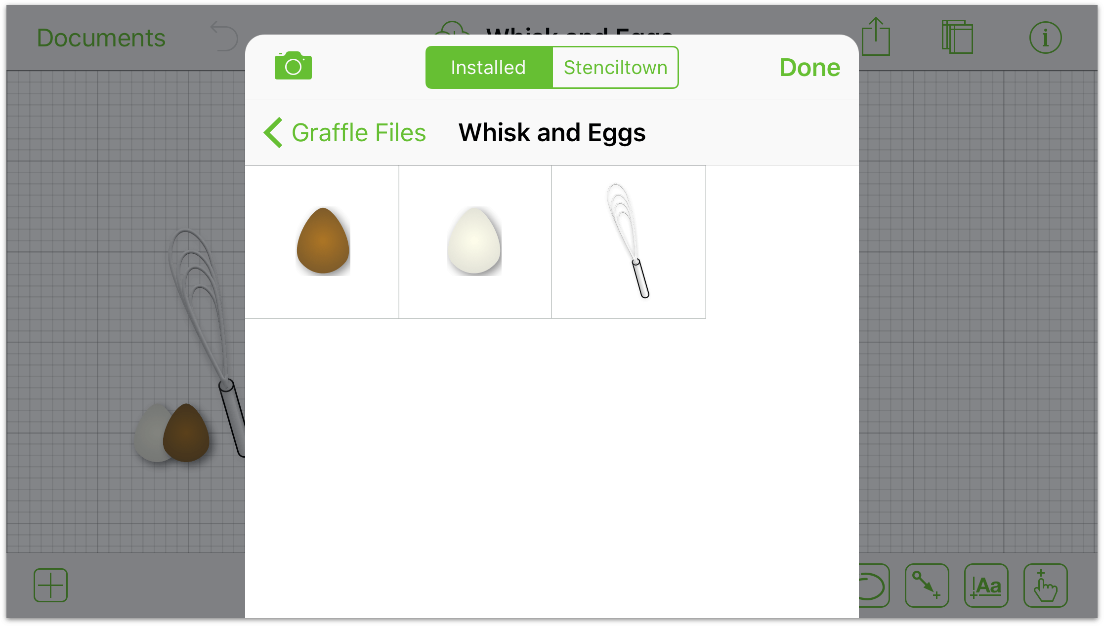 Two eggs and a whisk on the canvas
